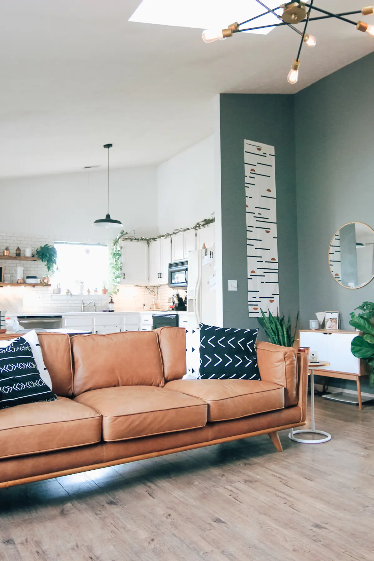 Small Entryway Ideas: 21 Smart Apartment Entrance Designs That Impress 8 Warm layered lighting and neutral hallway runner defining a small entryway zone