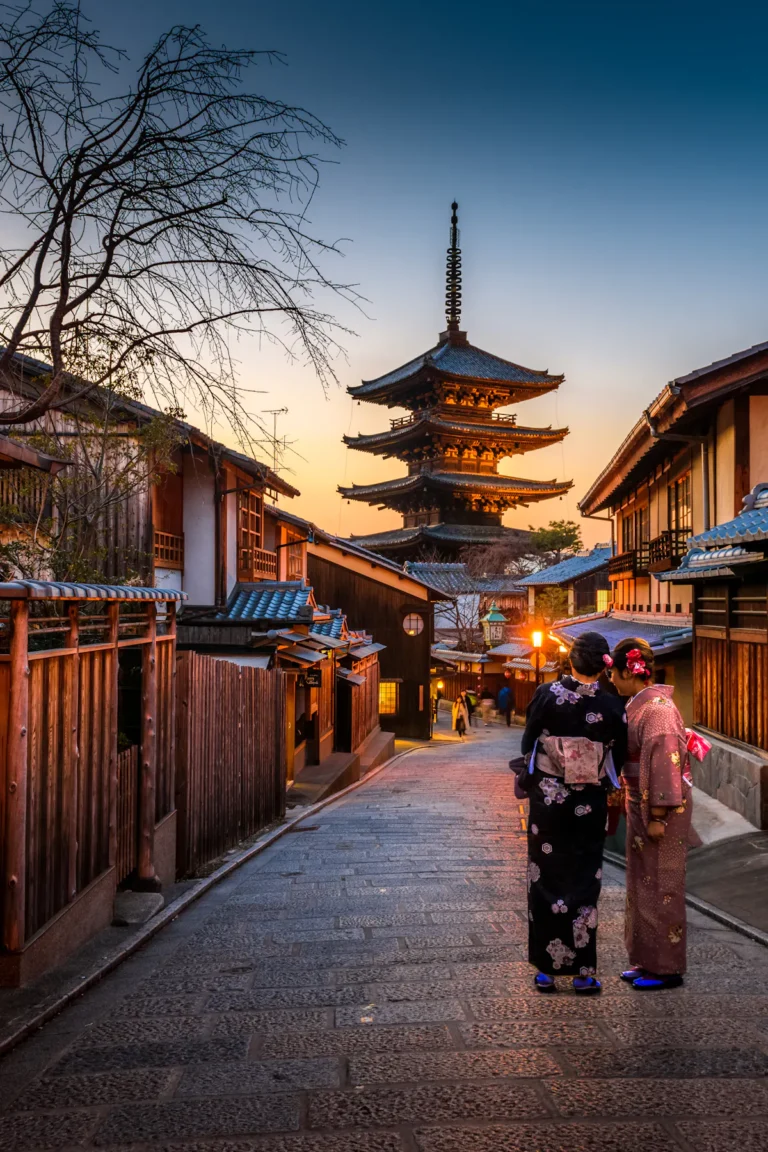 Japanese-style balcony decor with low cedar bench, slatted bamboo privacy screen, and neutral floor cushions