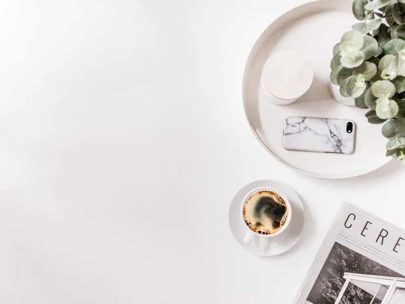 Work With Us & Media Kit | The Decor Nook Partnerships 5 Coffee, greenery and smartphone arranged for visual content planning